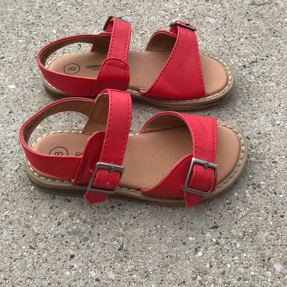 little girl in sandals